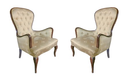 Due poltrone in legno di mogano  h 100, l 60 cm 