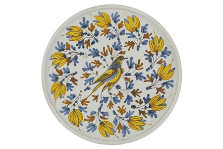 Alzata in maiolica policroma con “Uccellino” al centro
FIRENZE, sec. XVI, ultimi decenni.