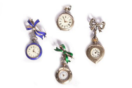 Lotto composto da quattro orologi da tasca in argento e smalti, fine secolo XIX