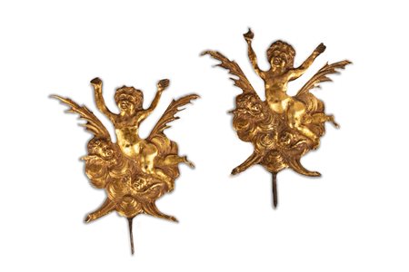 Due placche in bronzo dorato raffiguranti putti e cherubini, secolo XVII