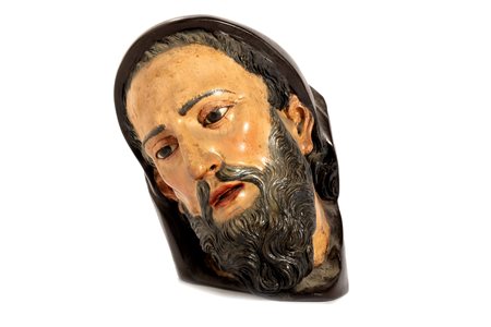 Antica scultura in legno laccato raffigurante testa di frate