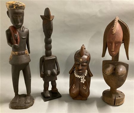 Arte africana, lotto di quattro sculture in legno parzialmente colorate, una co