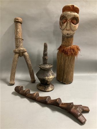 Arte africana, lotto composto da un totem (h cm 72) e tre pestelli di forme dif