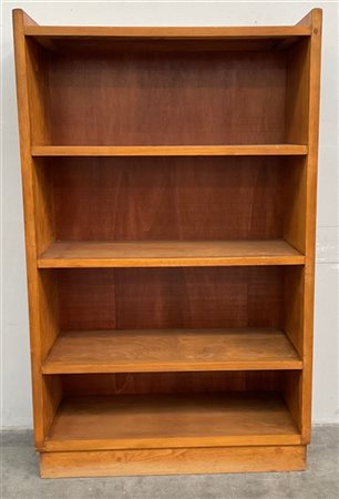 Piccola libreria in legno massello e impiallacciato a sei ripiani. Italia, anni
