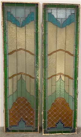 Coppia di vetrate con vetri policromi legati a piombo. (cm 50x180 ca,) (gravi d