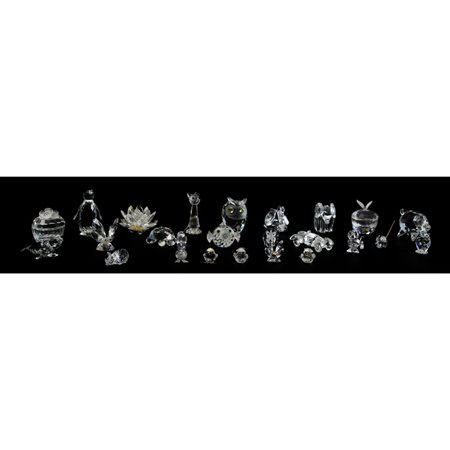 SWAROVSKI 
Collezione di ventiquattro oggetti