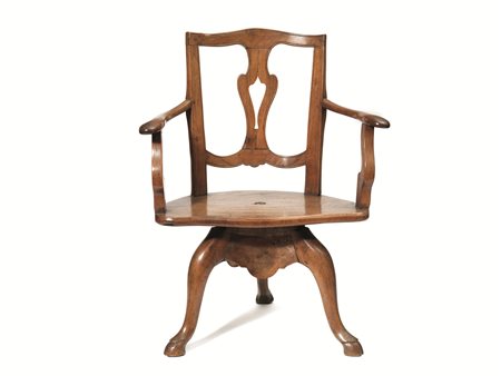 Poltrona girevole, Toscana, seconda metà sec. XVIII, in noce a patina bionda,...