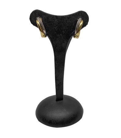 Orecchini a boccolo in oro giallo e bianco