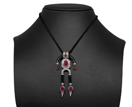 Pendentif in oro bianco, onice e rubini