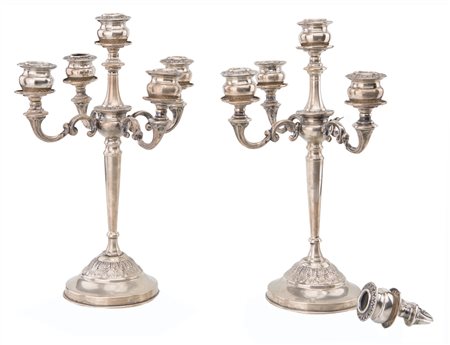 Coppia di candelabri in argento 800 a cinque luci
