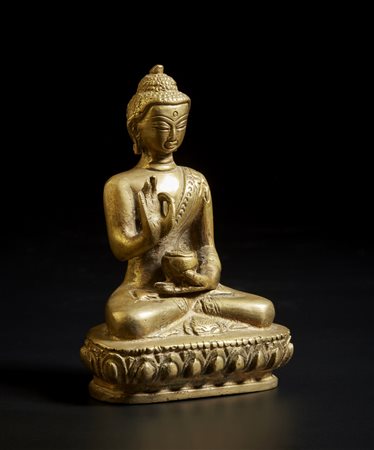 Arte Himalayana - Figura di Buddha in bronzo 
Nepal, XX secolo .