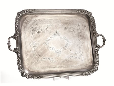 Guantiera, Inghilterra, secolo XX, in metallo argentato di forma rettangolare...