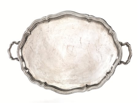 Guantiera, di forma ovale in argento, bordo smerlato, manici sagomati, cm...