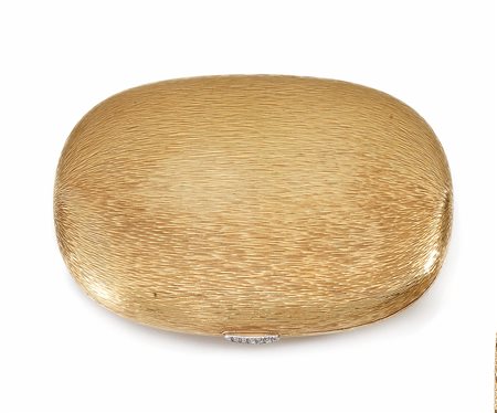 Portacipria in oro giallo e diamantidi forma ovale a savonnette in oro giallo...