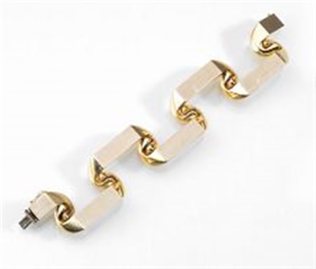 Bracciale, anni '70, in oro giallorealizzato a maglie semisnodabili a volute...