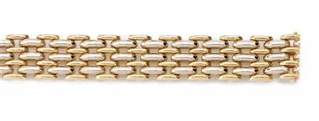 Bracciale in oro bianco ed oro giallorealizzato a maglia carrarmato formata...