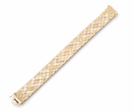 Bracciale in oro giallo e oro rosamontatura flessibile a nastro realizzata a...