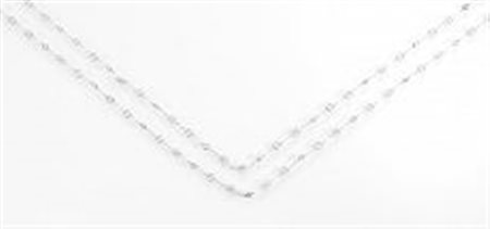 Lunga catena in oro bianco e diamantirealizzata a maglie fantasia lungo cui...