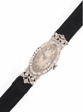 Orologio per signora, inizi sec. XX, in oro giallo, oro bianco e rose di...