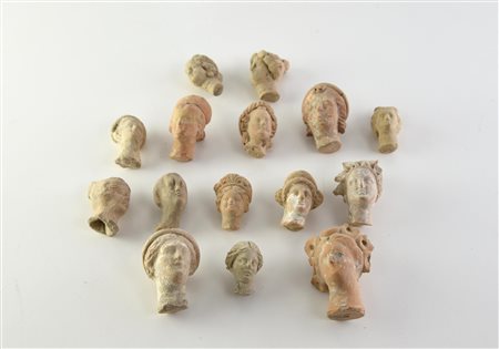 QUINDICI TESTE DI STATUETTE DATAZIONE: IV-III sec. a. C. MATERIA E TECNICA:...
