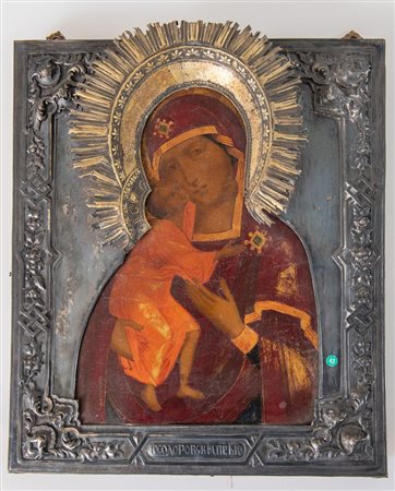 Icona entro riza in argento 84 zolotnik e recante corona in argento...