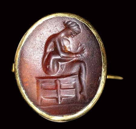 A fine greek agate intaglio set in a gold brooch. Scene of Toilette.<br><br>5th century B.C.