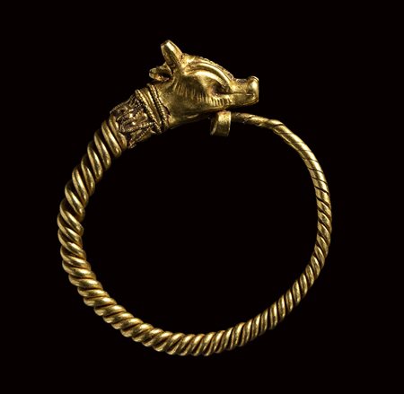 An hellenistic gold earring with animal protome. 3rd century B.C.