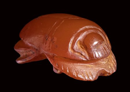 An egyptian late period carnelian scarab amulet.<br><br>664 - 332 B.C.