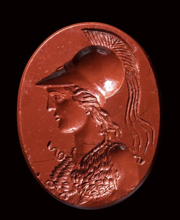 A large greek hellenistic red jasper intaglio. Bust of Athena. 3rd century B.C.