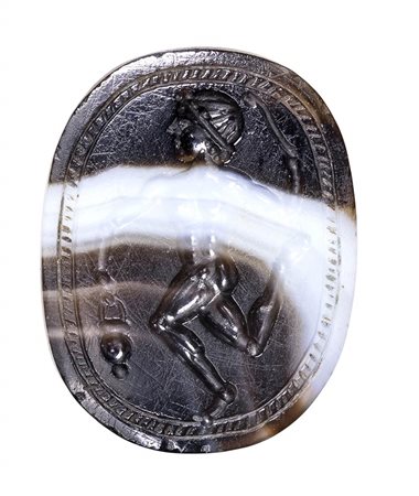 An italic banded agate engraved scarab. Athlete. <br><br>3rd - 2nd century B.C.