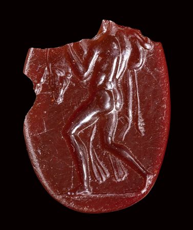A fine roman carnelian fragmentary intaglio. Hercules with the bull. <br><br>1st century B.C. 