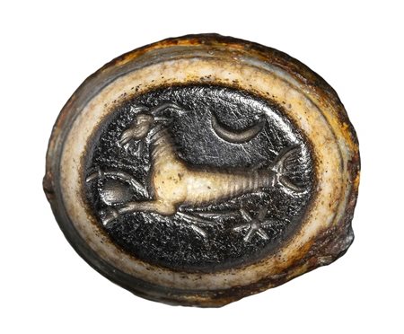 A roman agate intaglio. Seagoat with astrological attributes. <br><br>1st century A.D.