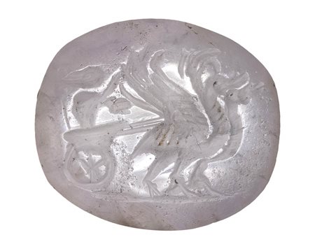 A roman rock crystal intaglio. A mouse  riding a chariot with swans. <br><br>2nd century A.D.