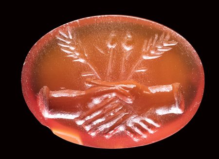 An italic carnelian intaglio. Dextrarum junctio. <br><br>1st century B.C. - 1st century A.D.