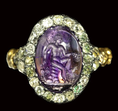 A fine roman amethyst intaglio set in a gold ring with diamonds. Seated Mercury with attributes. 1st - 2nd century A.D.