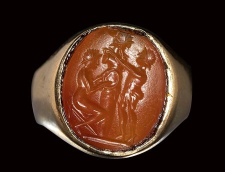 A roman carnelian intaglio mounted on a modern gold ring. Ritual scene with herm. <br><br>2nd century A.D. 