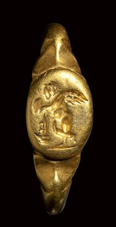 A late roman engraved gold ring. Funerary Erote. Late 2nd - 3rd century A.D.