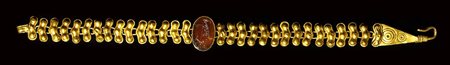 A fine roman gold bracelet with a sard intaglio. Shepard with a goat. 2nd - 3rd century A.D.