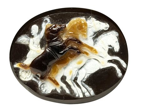 A large sardonyx roman cameo. Victory driving a quadriga. 1st-2nd century A.D.