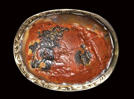 A fine roman moss agate intaglio set in a gilded frame. Meleager kills the boar.<br><br>1st - 2nd A.D.