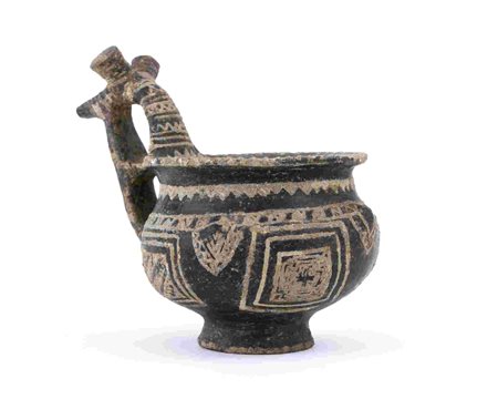 VILLANOVAN IMPASTO CUP 9th - 8th centuries BC height cm 11 A rare example of...