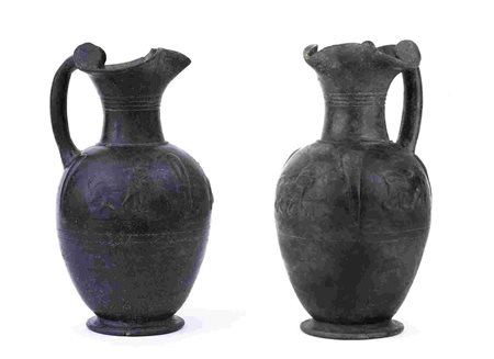 COUPLE OF ETRUSCAN BUCCHERO OINOCHOAI ca. 550 BC height cm 30 and 31 Molded...