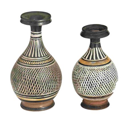 COUPLE OF APULIAN GNATHIA-WARE 'NET' BOTTLES Late 4th century BC height max...