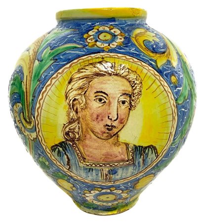 Gesualdo Di Bartolo -  Bombola in maiolica policroma di Caltagirone, con doppio medaglione centrale e decori floreali a larghe foglie nei toni del verde e del giallo con fondo blu., late 19°  secolo