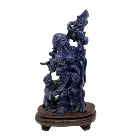 Scultura cinese, uomo in piedi in lapislazzuli su basetta., 20°  secolo