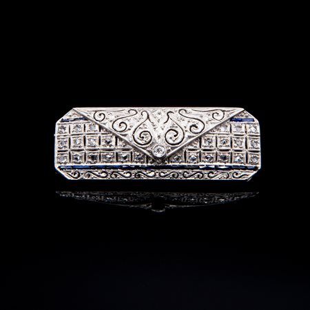 Spilla in platino, diamanti e zaffiri