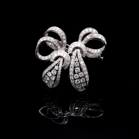 Duette a volute in oro bianco e diamanti