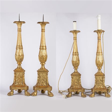 Quattro torcere in legno dorato