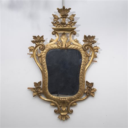 Specchiera in legno intagliato e dorato