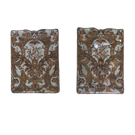 Coppia di dipinti su cuoio